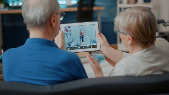 senior-couple-attending-online-meeting-with-doctor-digital-tablet-doing-remote-consultation-home-elder-people-using-videoconference-call-modern-gadget-internet-telemedicine-1